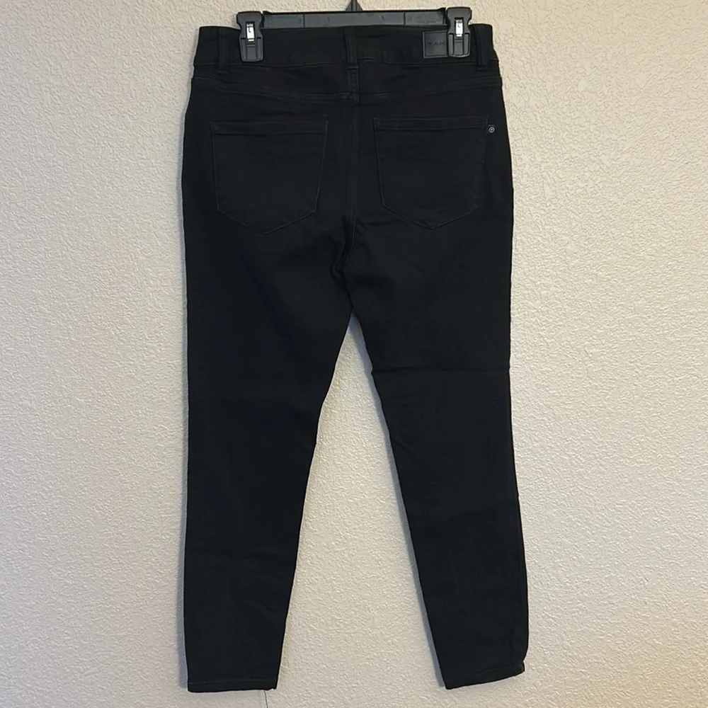 Women’s black skinny jeans size 10.